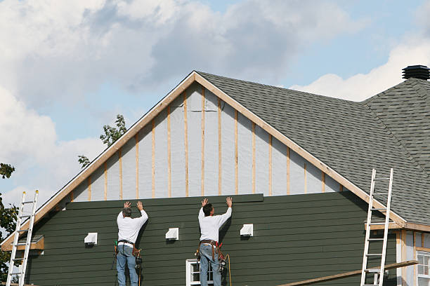 Professional Storm Damage Siding Repair technician working in Wallingford, PA